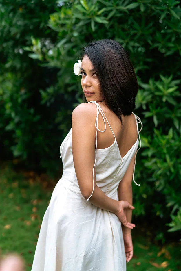 Off white high low cut dress with stringy shoulder strap